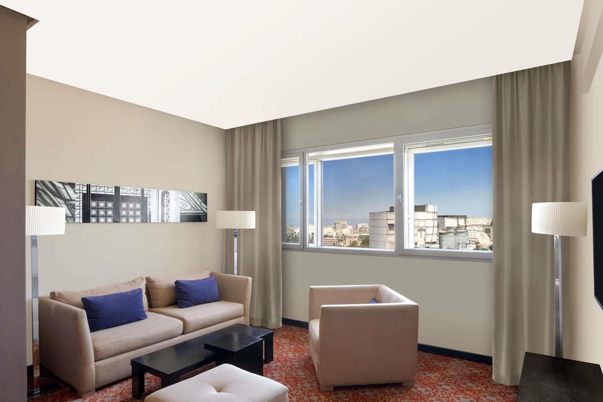 Premium bedding, down comforters, minibar, in-room safe