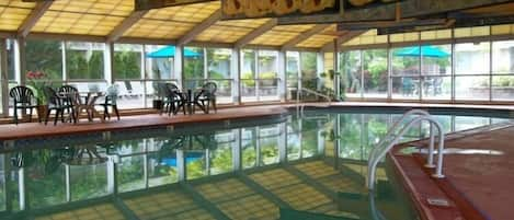 Indoor pool, open 8 AM to 9 PM, pool loungers