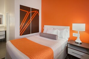 Coffres-forts dans les chambres, bureau, fer et planche à repasser