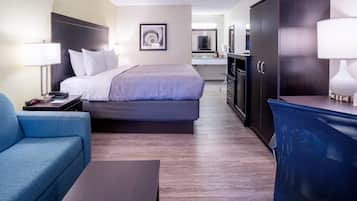 Room, 1 King Bed, Non Smoking | Desk, laptop workspace, blackout curtains, iron/ironing board