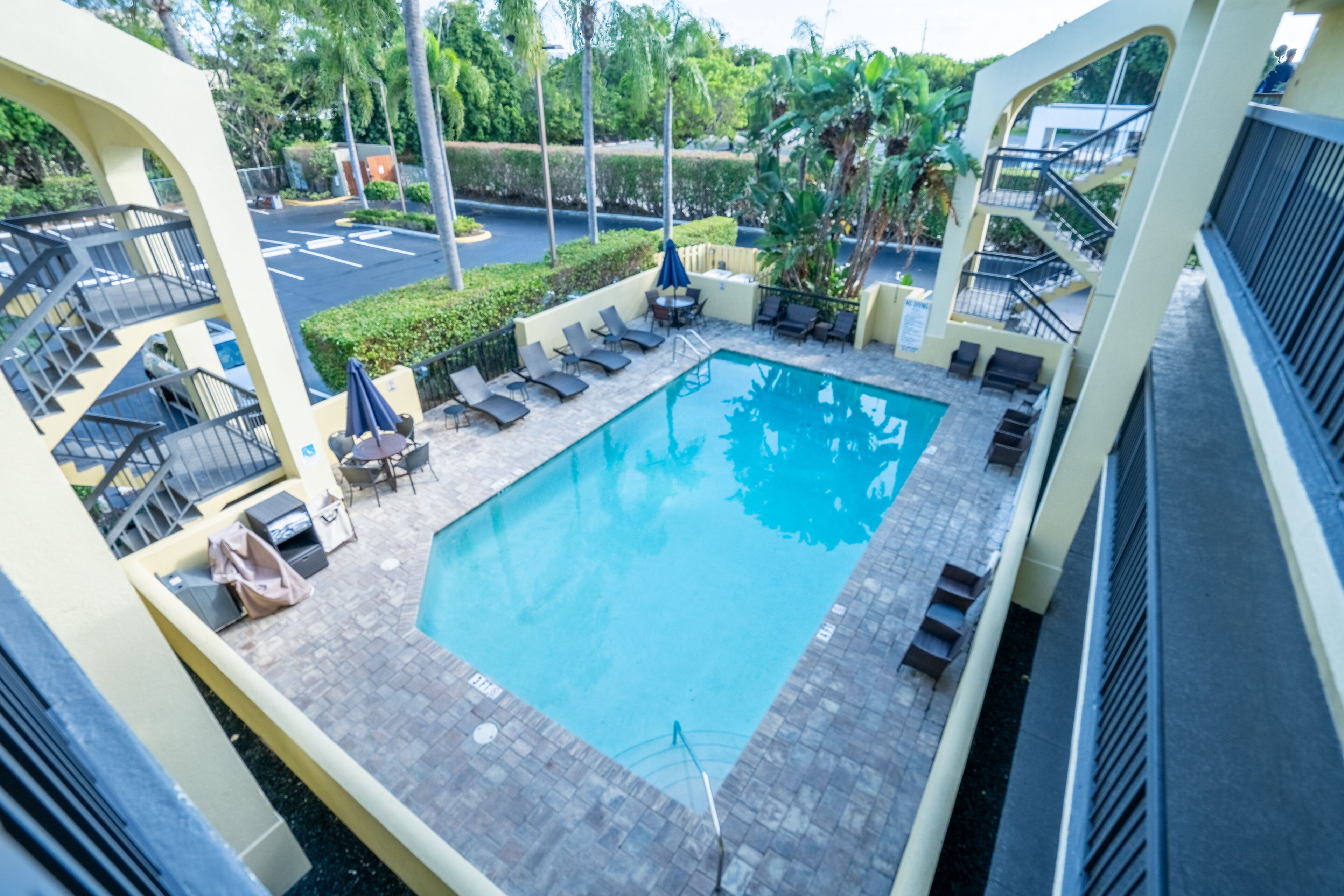 Outdoor pool, open 9:00 AM to 9:00 PM, pool umbrellas, sun loungers