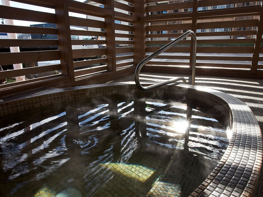 Seasonal outdoor pool, open 9:00 AM to 9:00 PM, pool loungers