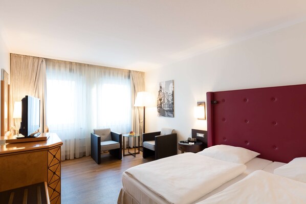 Literie hypoallergénique, minibar, coffres-forts dans les chambres