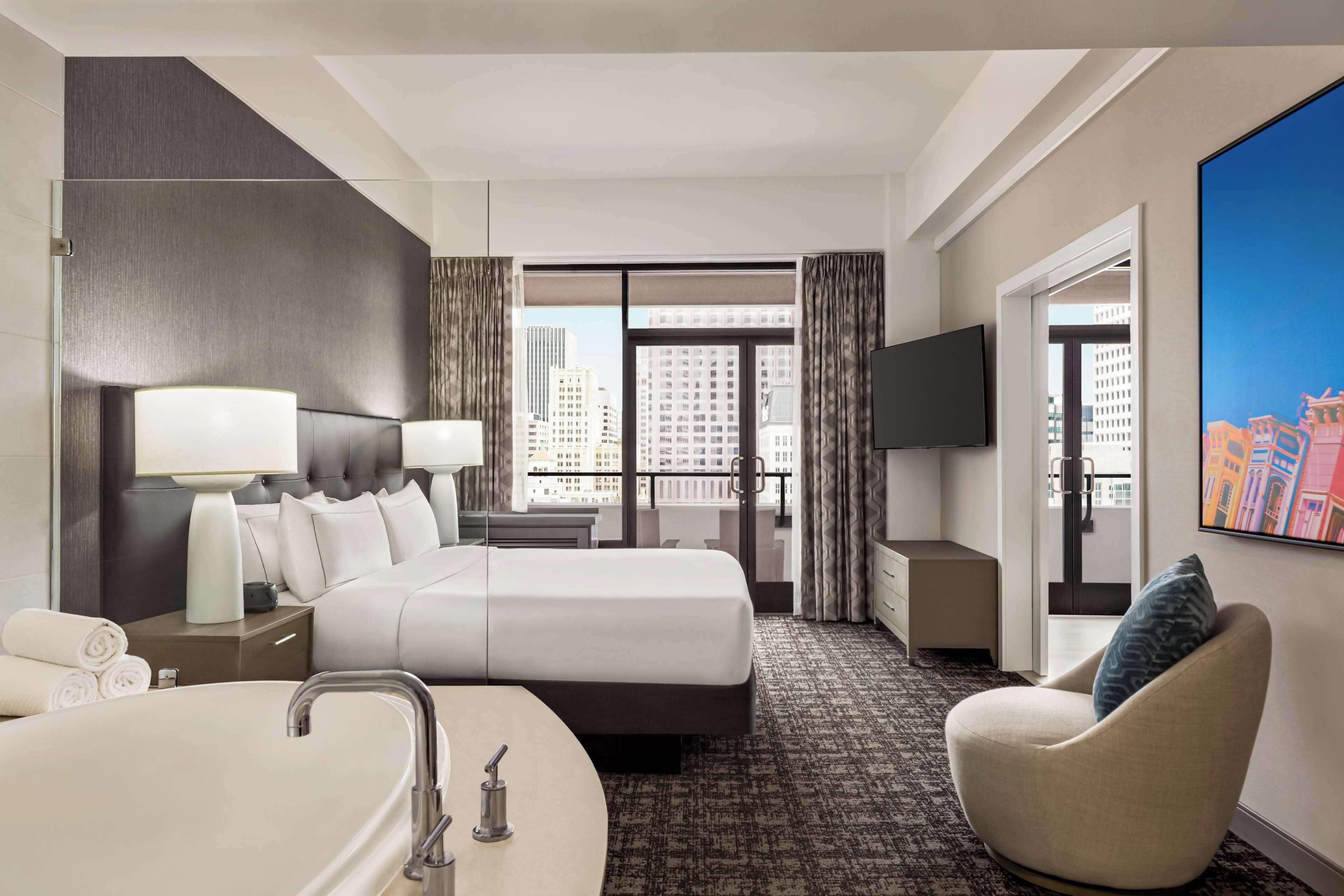 Premium bedding, down duvets, pillow-top beds, in-room safe