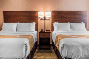 Desk, blackout drapes, iron/ironing board, free cribs/infant beds