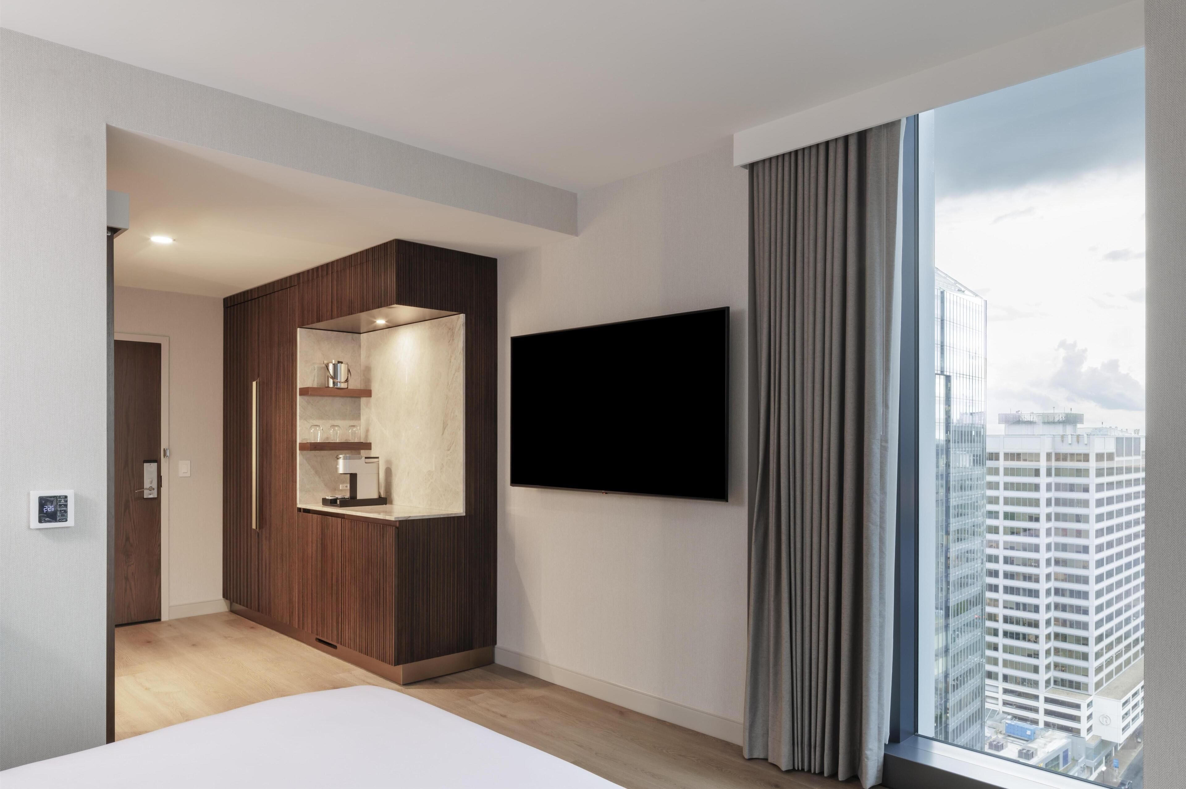 65-inch flat-screen TV with cable channels, TV, Netflix