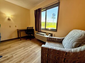 1 bedroom, desk, blackout drapes, iron/ironing board