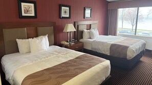Deluxe Double Room | 1 bedroom, in-room safe, desk, blackout drapes