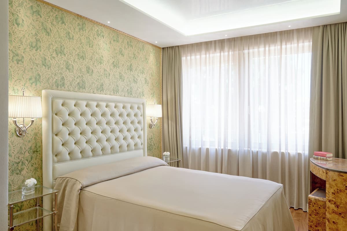 Habitación individual Deluxe, vista a la ciudad | 1 habitación, sábanas de algodón egipcio y ropa de cama de alta calidad