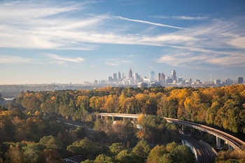 In-room safe, desk, laptop workspace, blackout drapes at JW Marriott Atlanta Buckhead