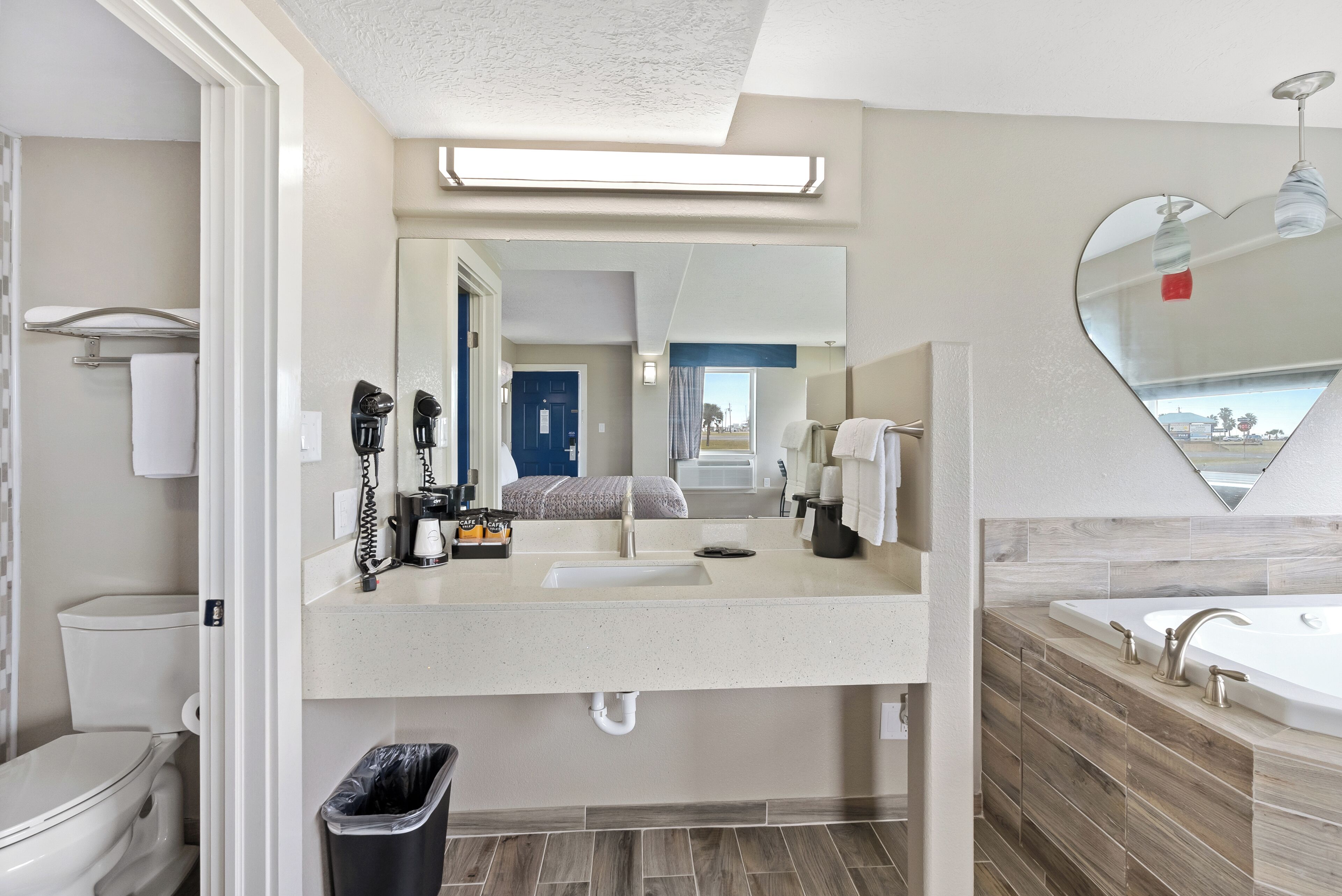 honeymoon suite, 1 king bed, non smoking | bathroom | bathtub, hair dryer, towels