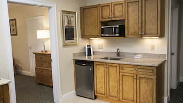 Suite, 1 Bedroom | Living area | 32-inch LCD TV with cable channels, TV, DVD player