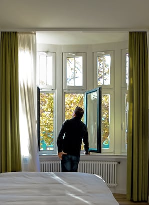Premium bedding, down duvets, memory-foam beds, in-room safe