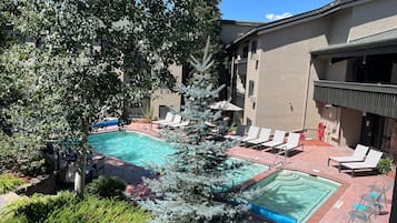 Outdoor pool, pool umbrellas, pool loungers