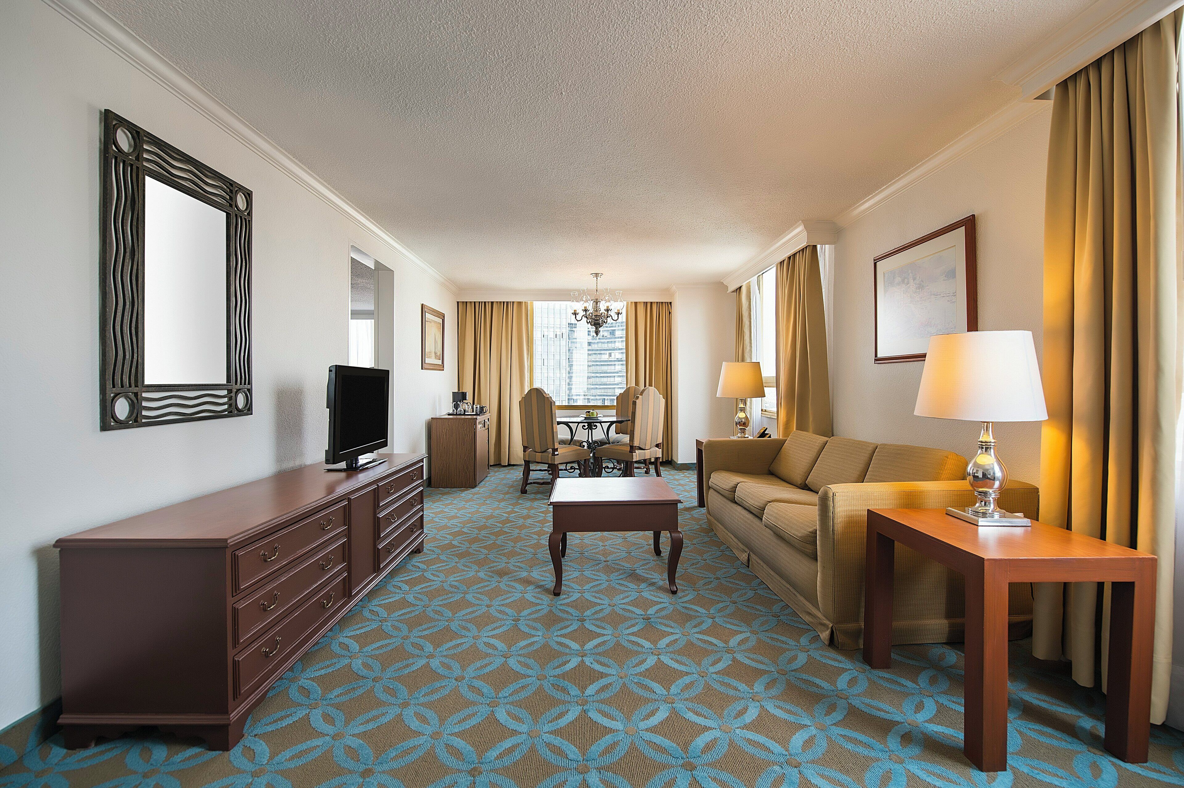 Premium bedding, down comforters, minibar, in-room safe