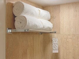 Premium bedding, down comforters, minibar, in-room safe