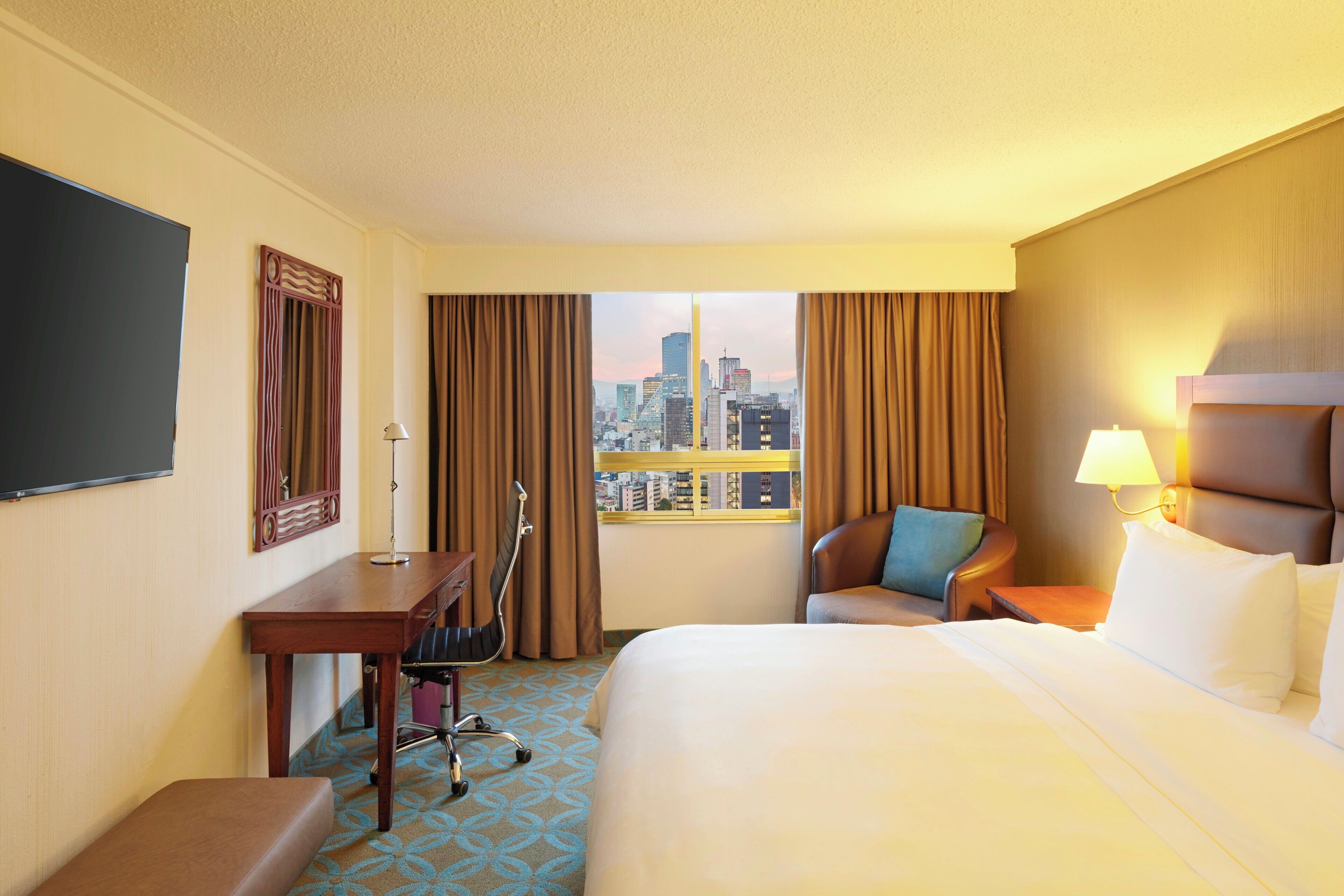 Deluxe Room, 1 King Bed | Premium bedding, down comforters, minibar, in-room safe