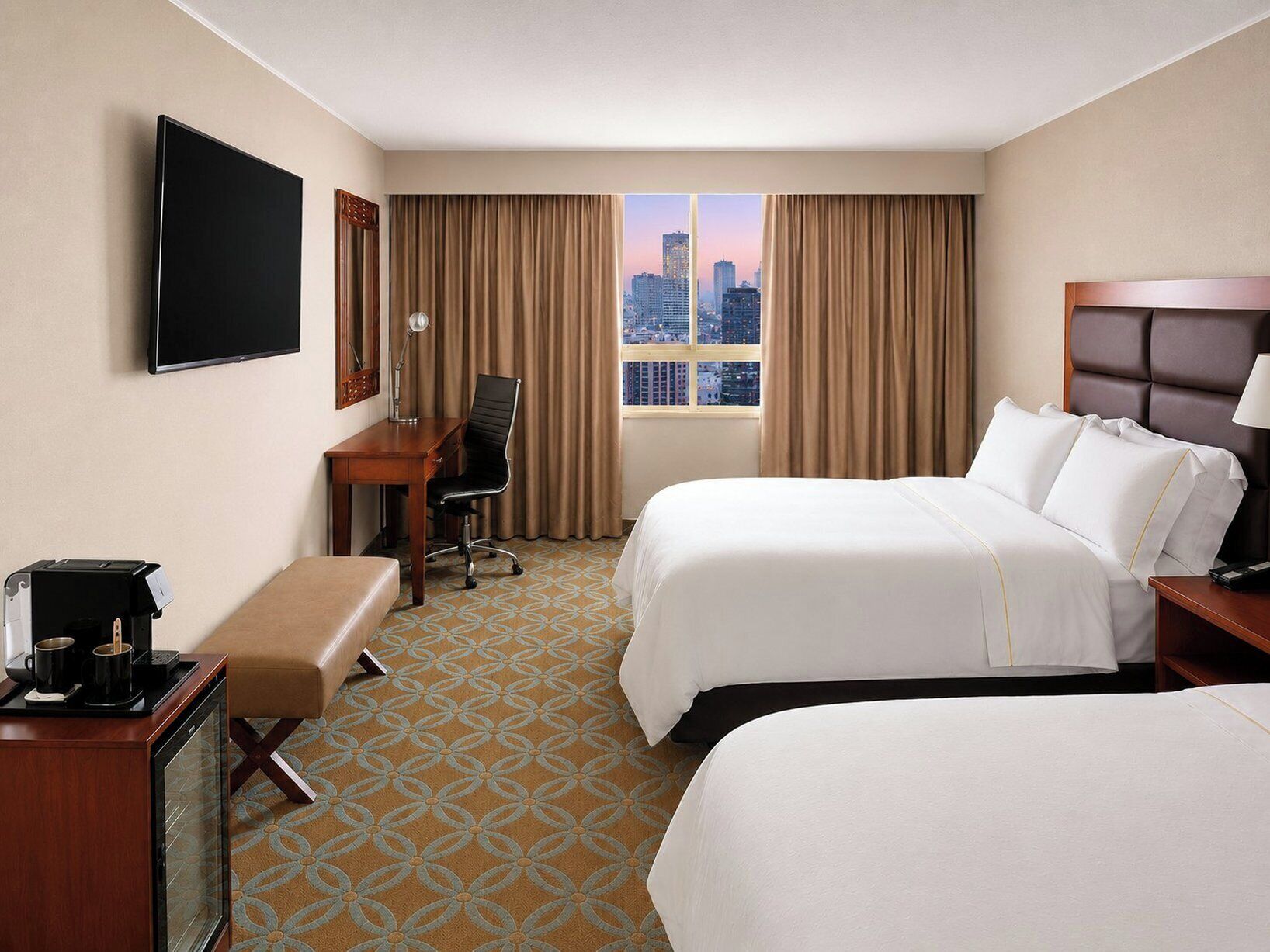 Premium bedding, down comforters, minibar, in-room safe