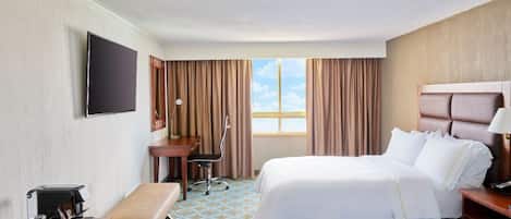 Premium bedding, down comforters, minibar, in-room safe