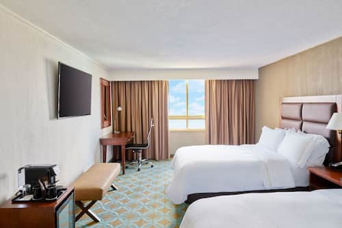 Premium bedding, down duvets, minibar, in-room safe