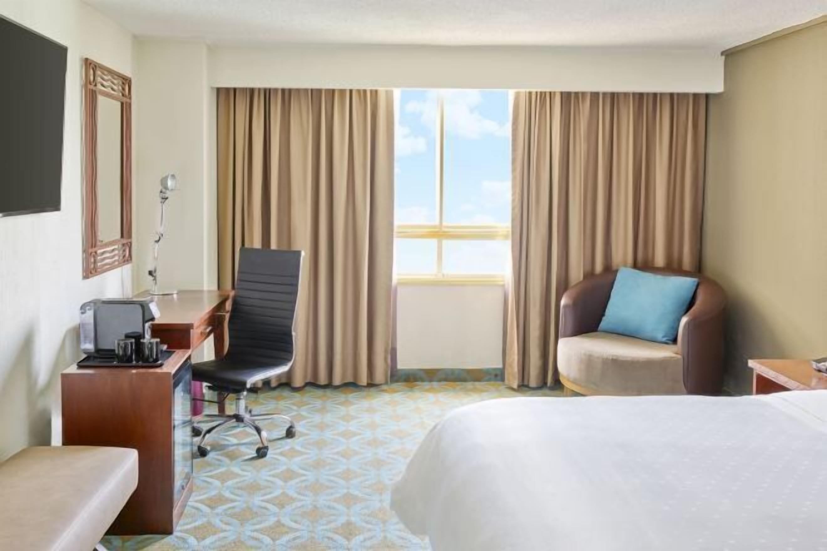 Premium bedding, down comforters, minibar, in-room safe