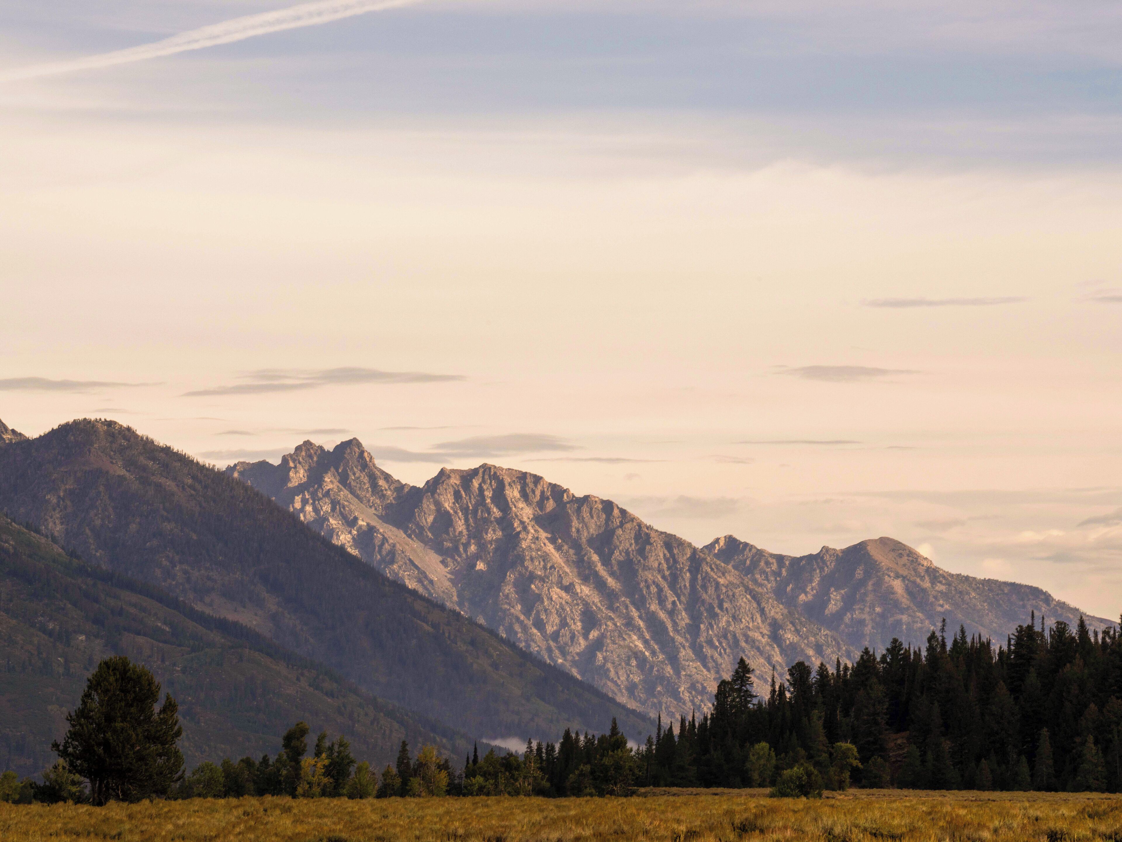 A mountainous landscape with a clear sky.