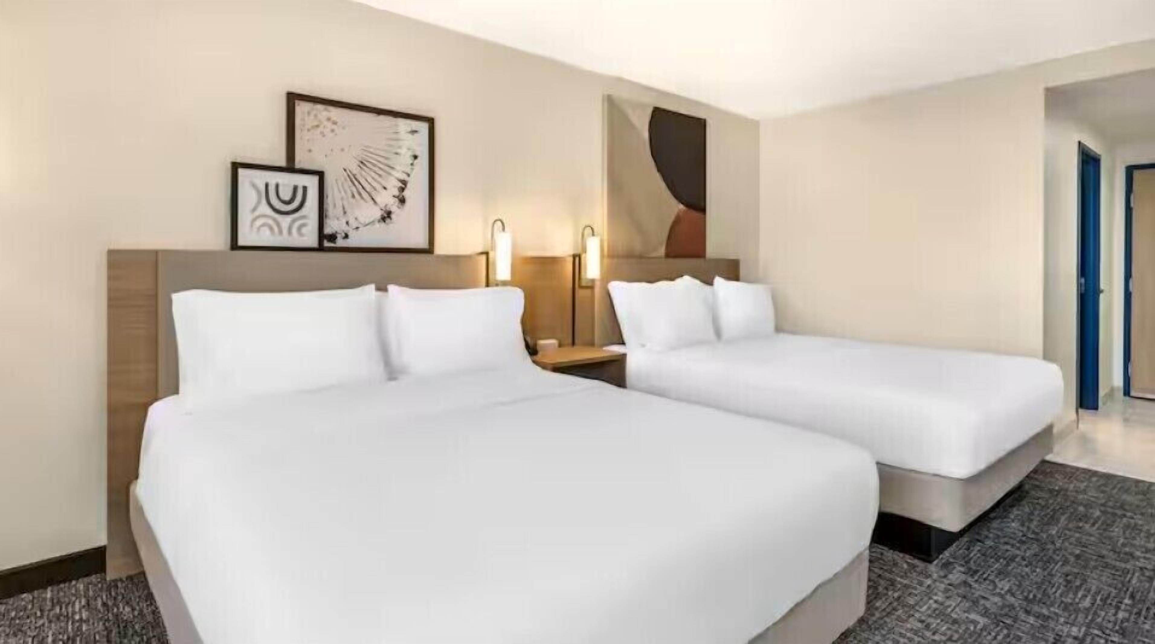 Room, 2 Queen Beds, Accessible, Bathtub (Mobility) | Desk, laptop workspace, blackout drapes, iron/ironing board