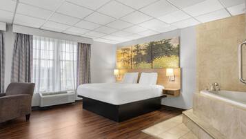 Suite Studio, 1 trĂšs grand lit, non-fumeur (First Floor) | Baignoire Ă jets