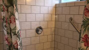 Superior Studio, 1 Queen Bed, Kitchen | Bathroom | Combined shower/tub, free toiletries, hair dryer, towels