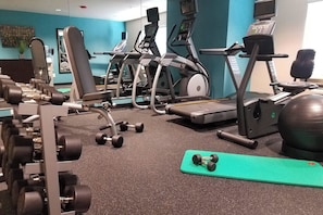 Stay fit on the road with our fully equipped gym featuring treadmills, elliptical, and free weights.