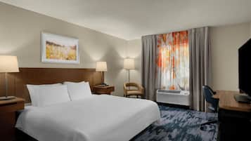 Room, 1 King Bed | Desk, blackout drapes, iron/ironing board, free WiFi