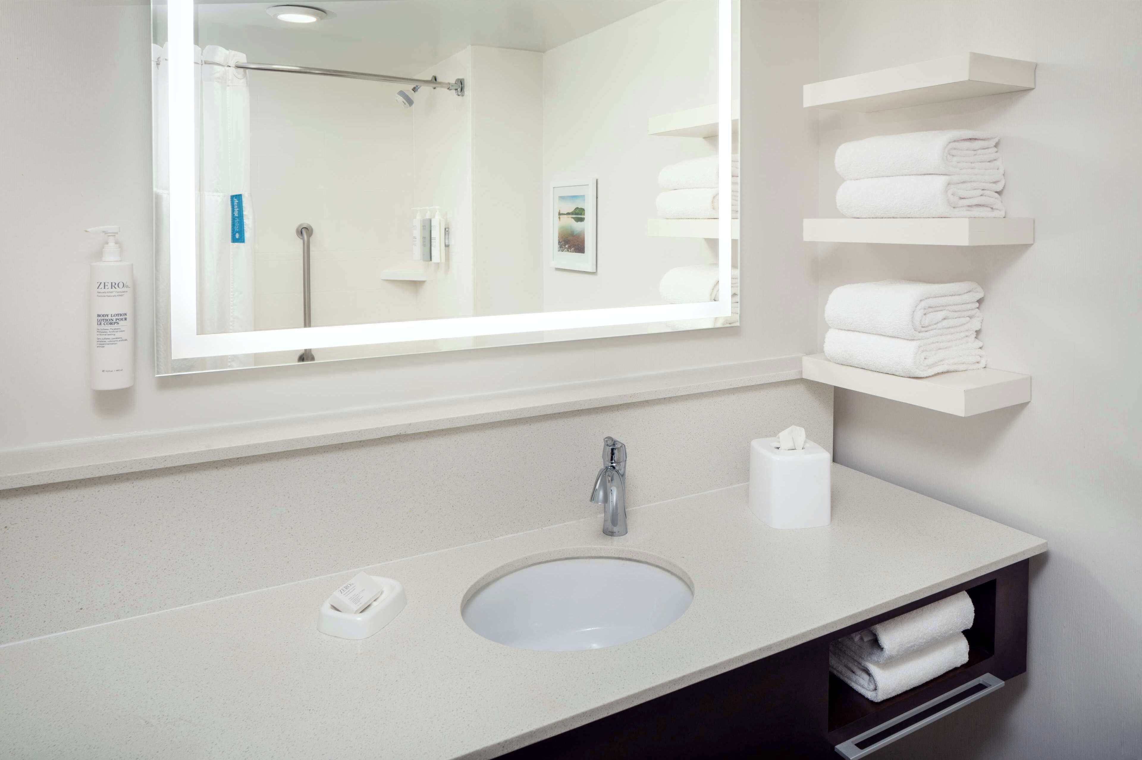 combined shower/bathtub, free toiletries, hair dryer, dressing gowns