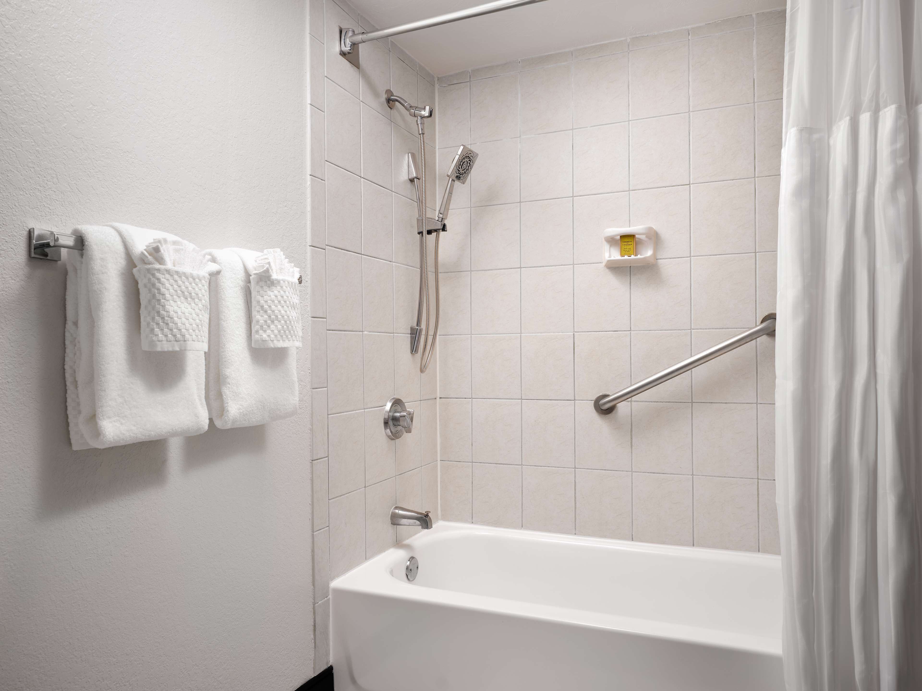 room, 1 queen bed, balcony (hearing) | bathroom | designer toiletries, hair dryer, towels, soap