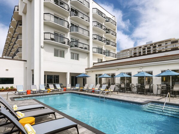 Outdoor pool, open 8:00 AM to 10:00 PM, pool umbrellas, pool loungers