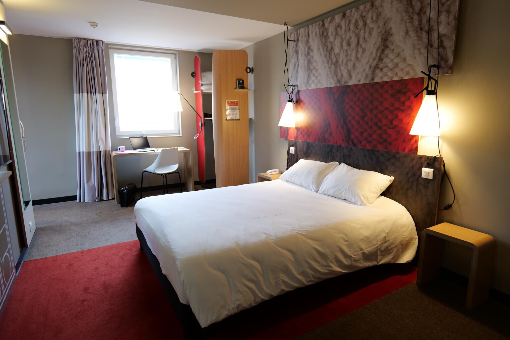 Premium bedding, desk, laptop workspace, blackout curtains