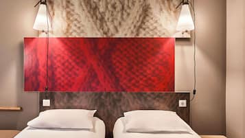 Premium bedding, desk, laptop workspace, blackout drapes