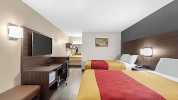 Bureau, fer et planche à repasser, lits bébé (en supplément)