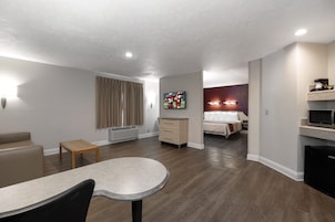 Superior Room, 1 King Bed, Non Smoking (2 Room) | Desk, laptop workspace, blackout drapes, iron/ironing board