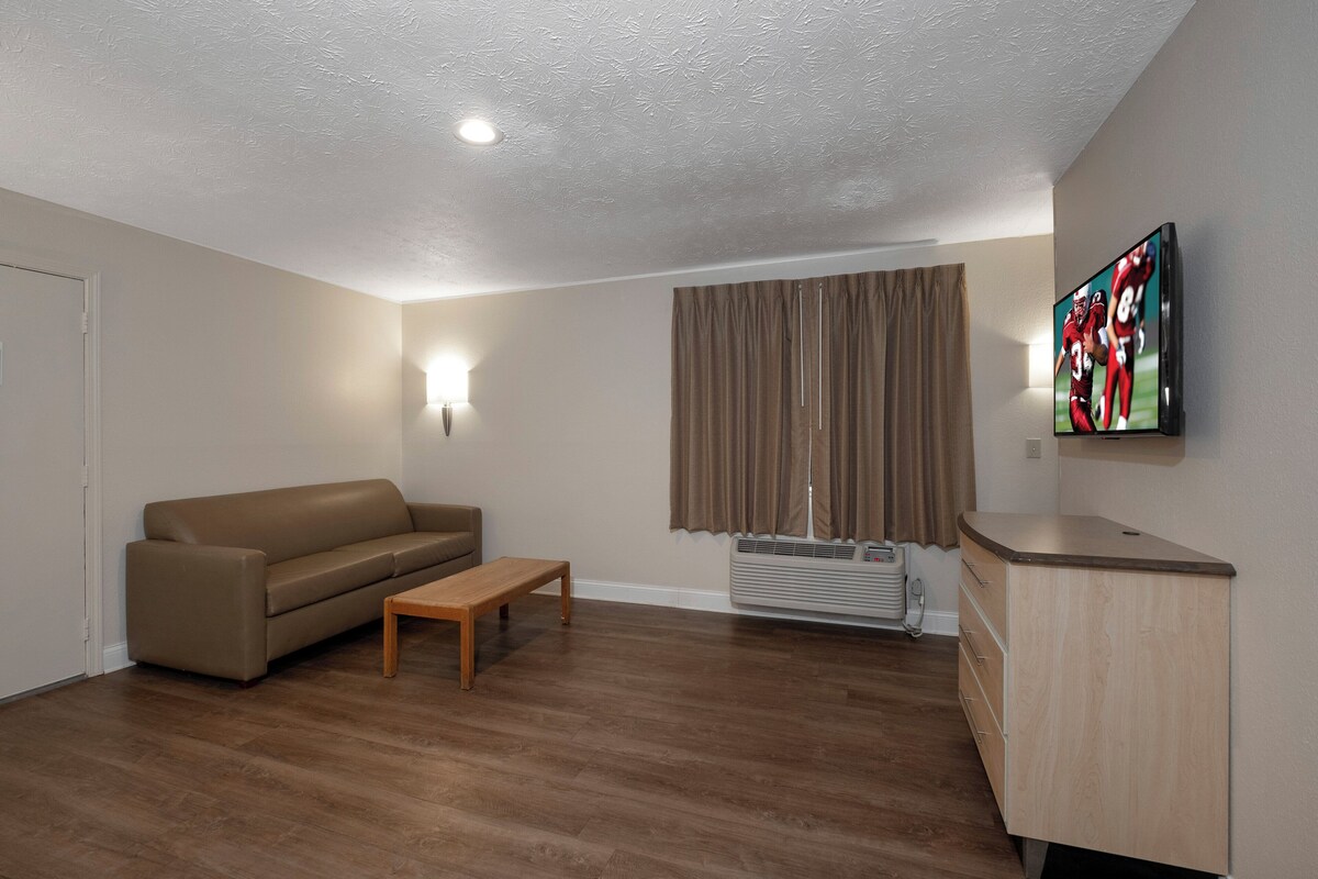 Desk, laptop workspace, blackout curtains, iron/ironing board