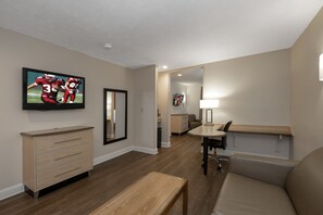 Suite, 1 Queen Bed, Non Smoking | Desk, laptop workspace, blackout drapes, iron/ironing board