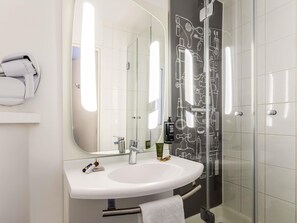 Shower, eco-friendly toiletries, hair dryer, towels