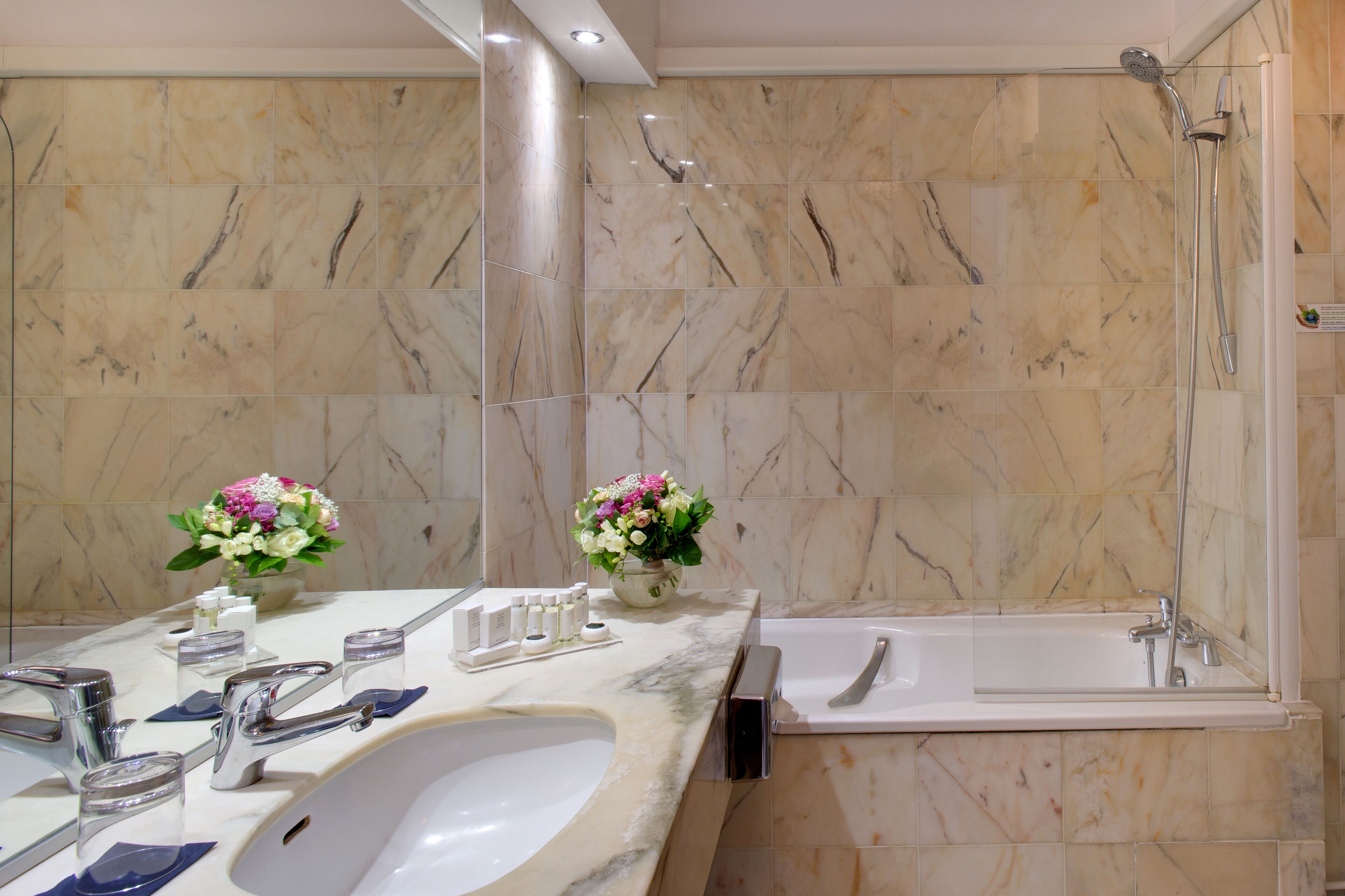 combined shower/bathtub, deep-soaking bathtub, designer toiletries