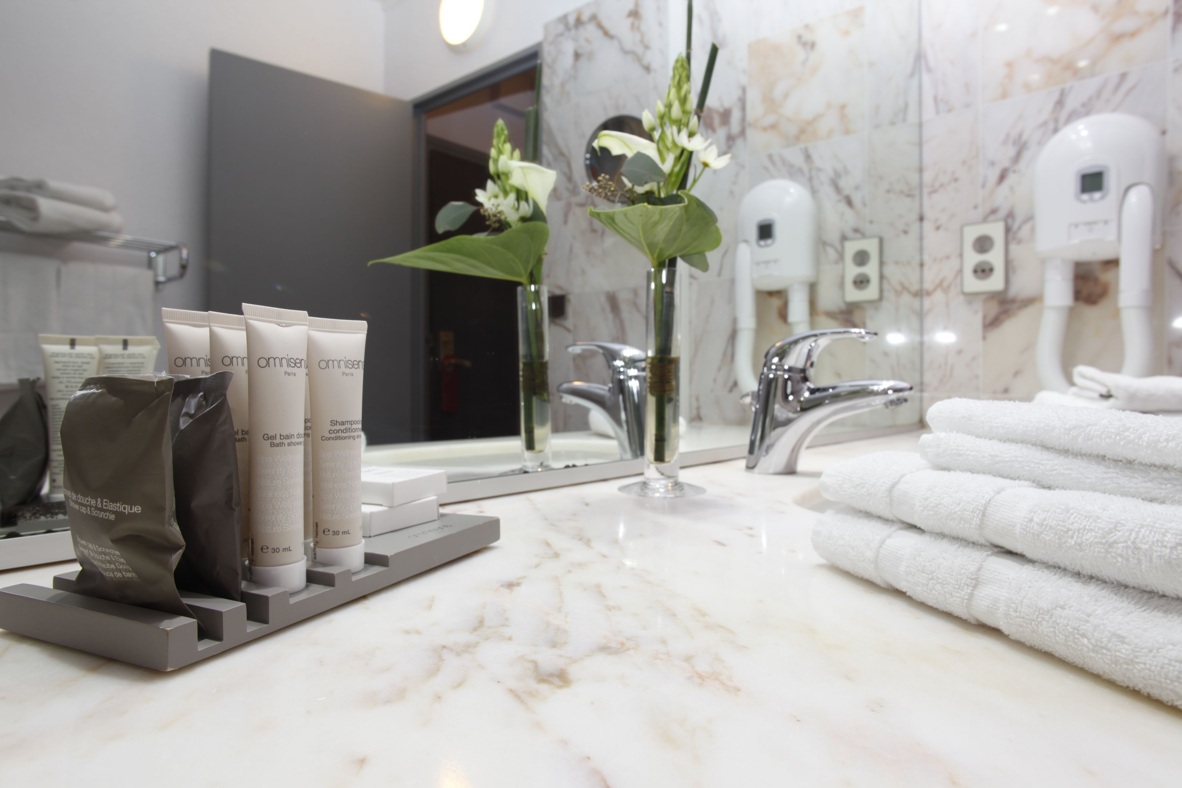 combined shower/bathtub, deep-soaking bathtub, designer toiletries