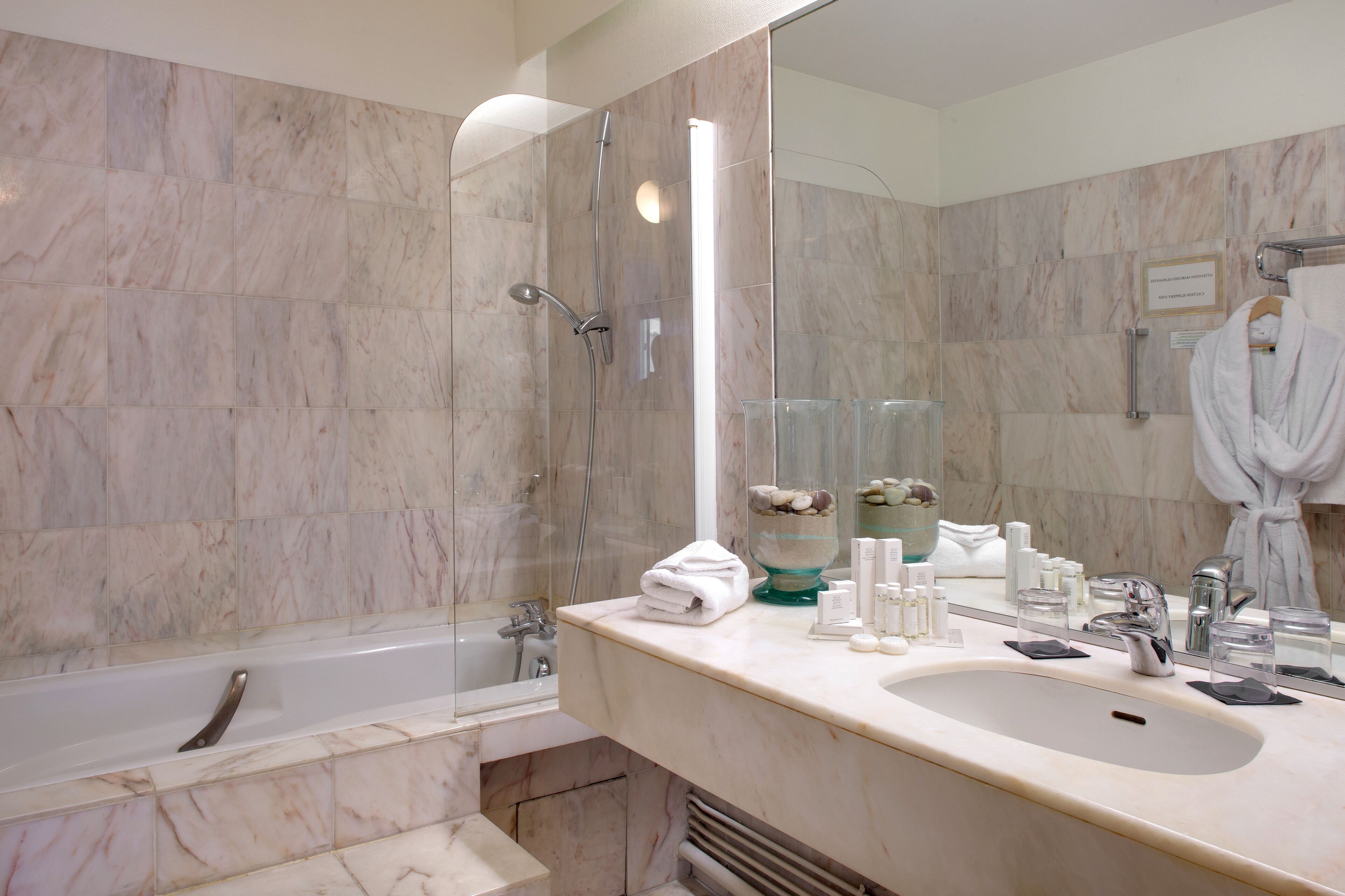 combined shower/bathtub, deep-soaking bathtub, designer toiletries