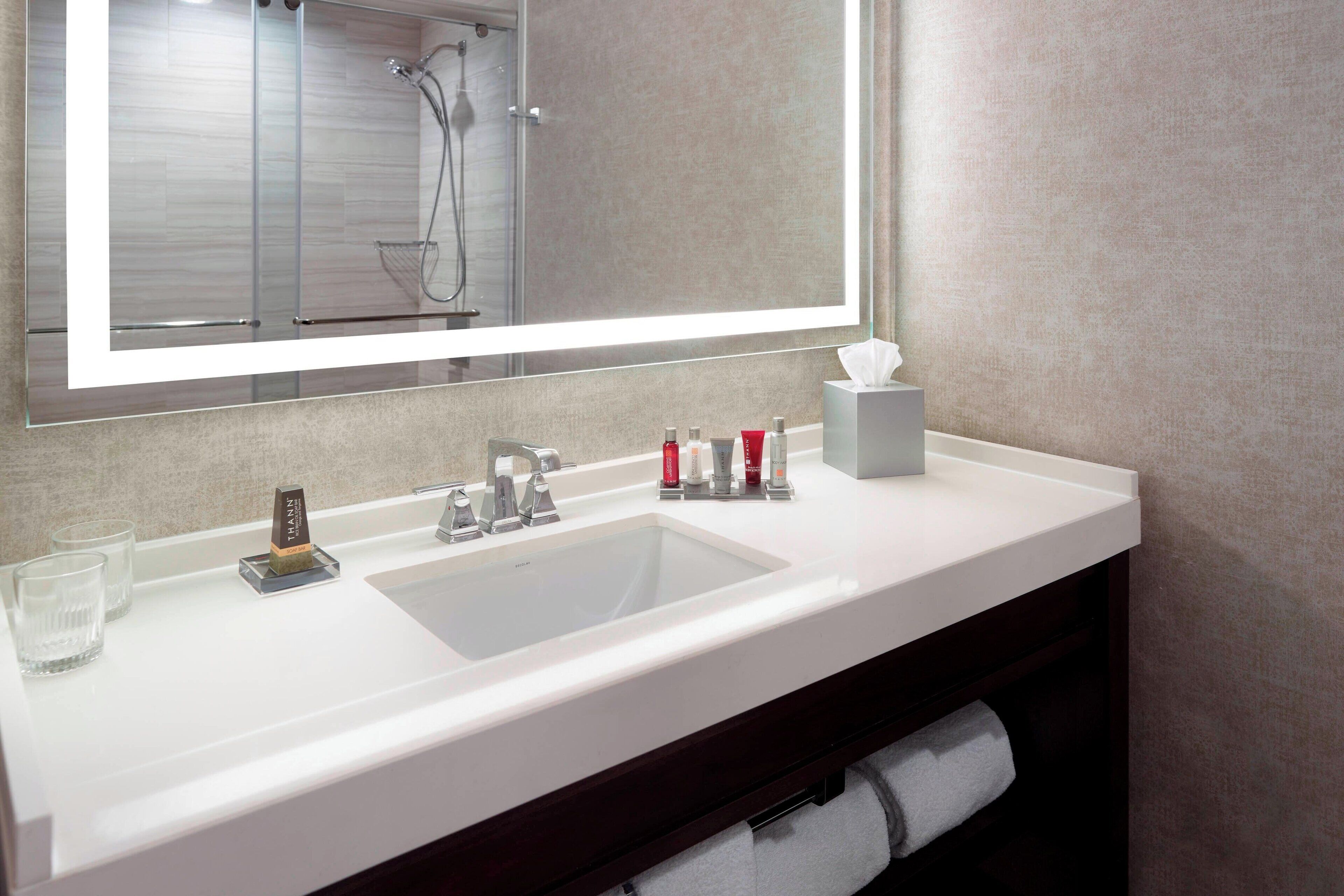 combined shower/bathtub, free toiletries, hair dryer, slippers