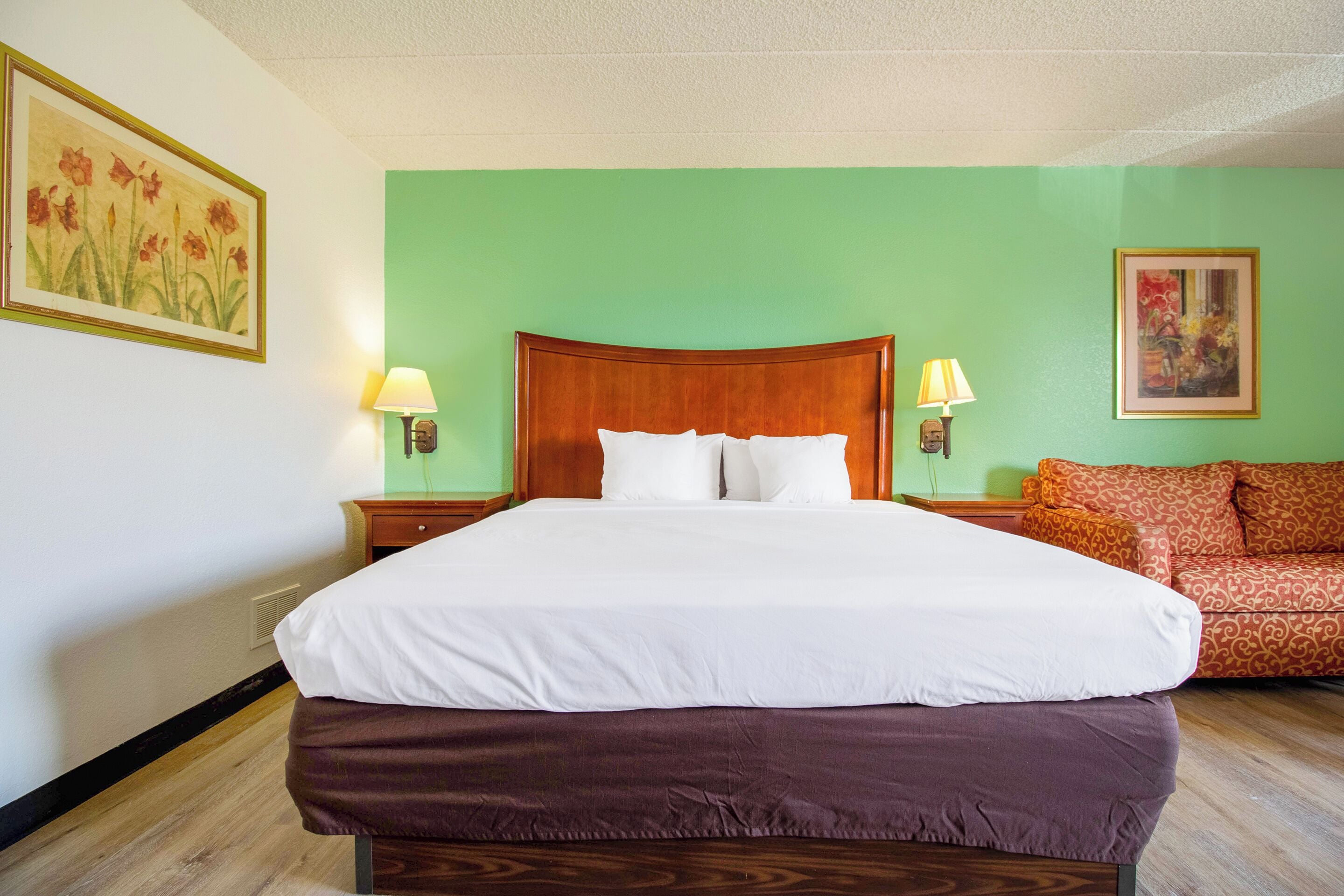 Hypo-allergenic bedding, desk, laptop workspace, blackout curtains