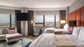 Premium bedding, down comforters, pillowtop beds, in-room safe