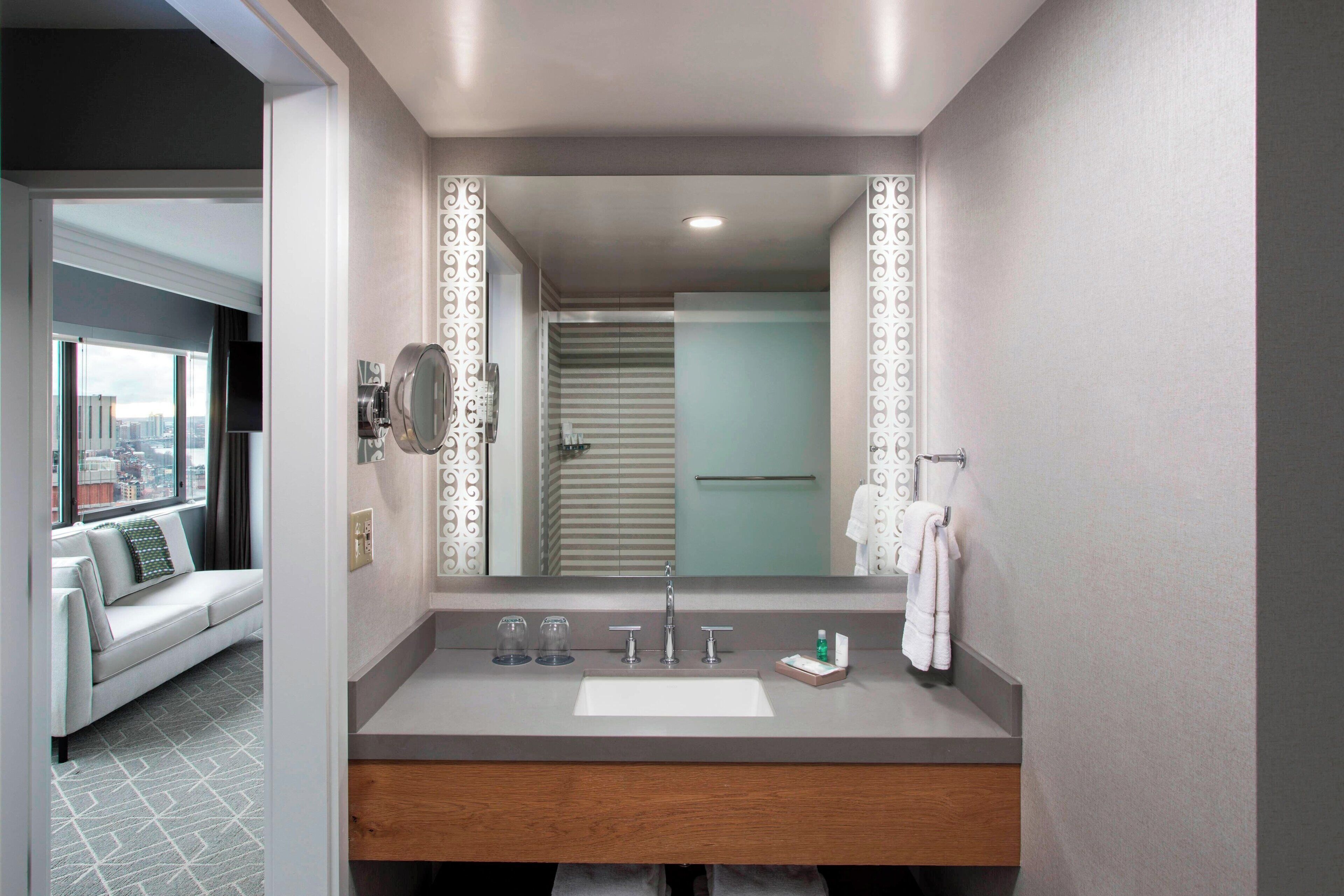 eco-friendly toiletries, hair dryer, bathrobes, towels