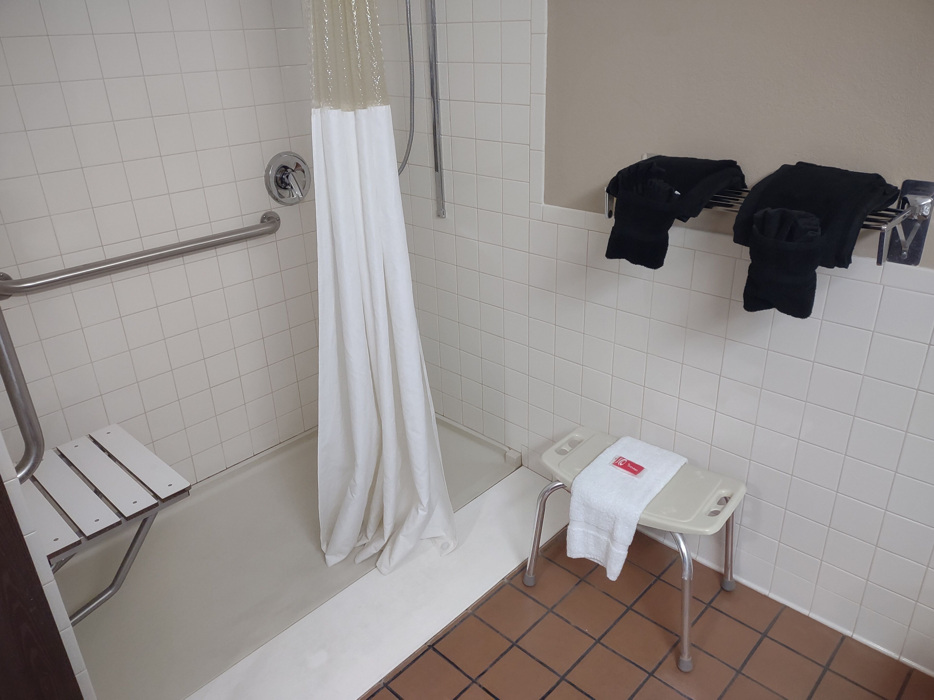 combined shower/bathtub, free toiletries, hair dryer, towels