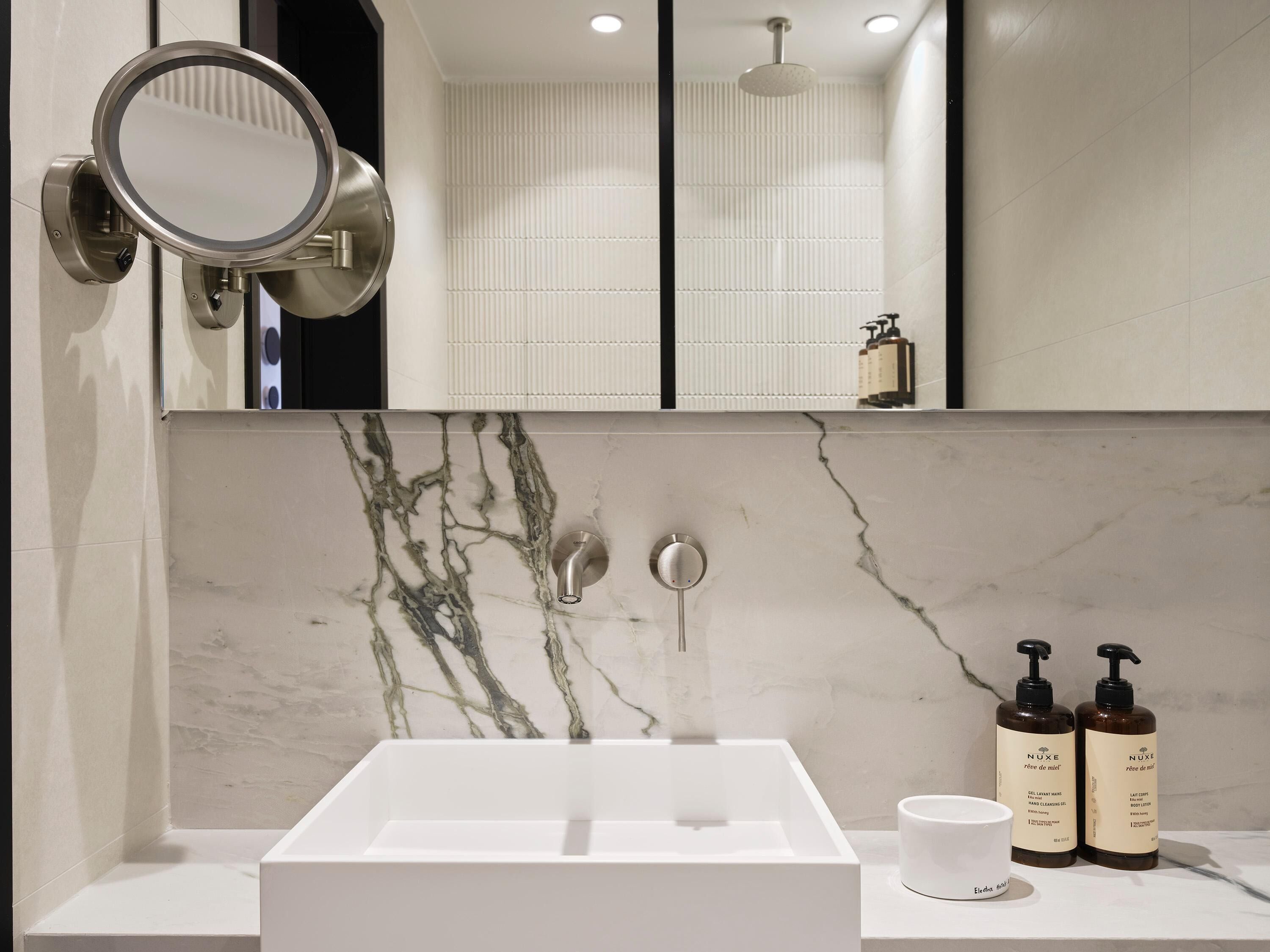 cozy | bathroom | designer toiletries, hair dryer, bathrobes, slippers